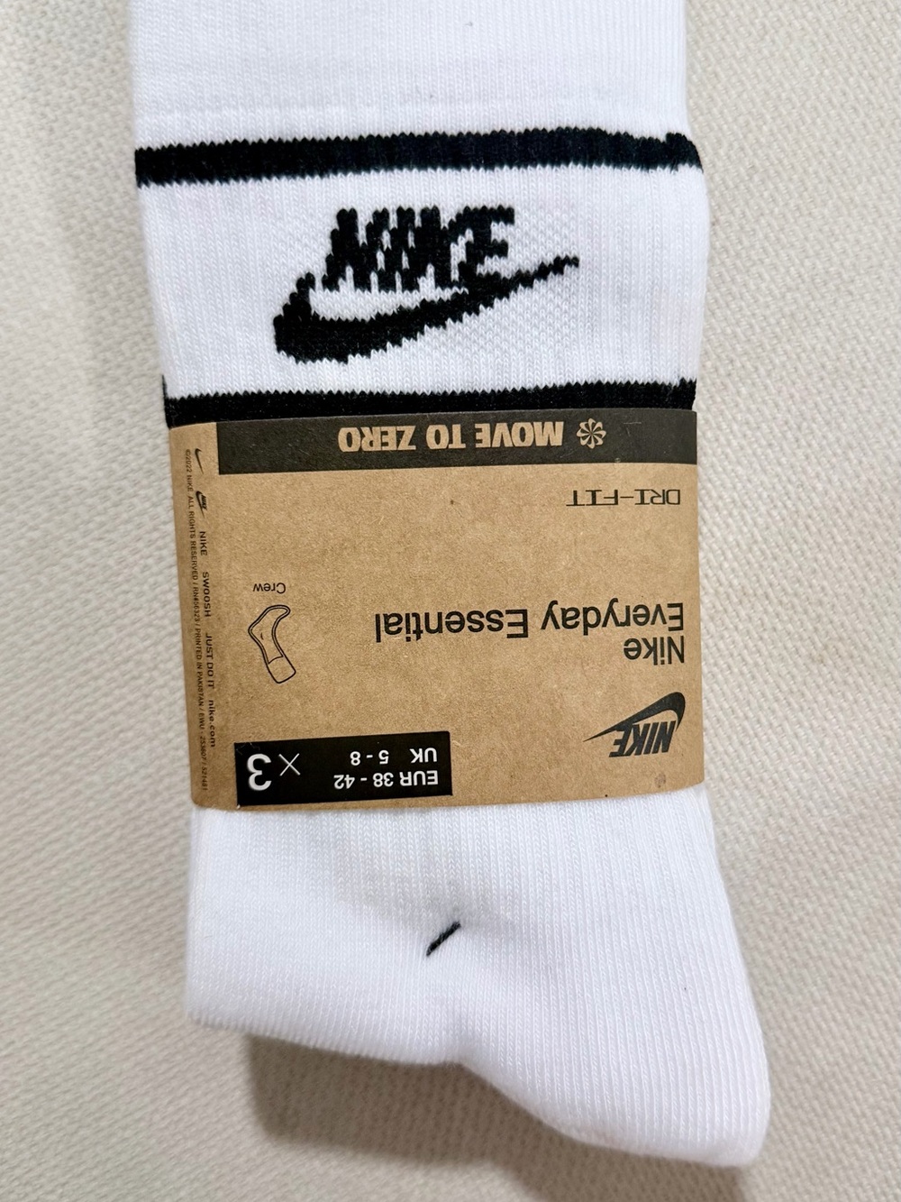 Nike White Crew Athletic Socks with Black Logo and Stripes
